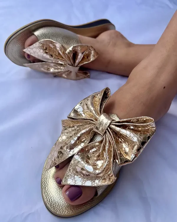 Sandalia plana moño